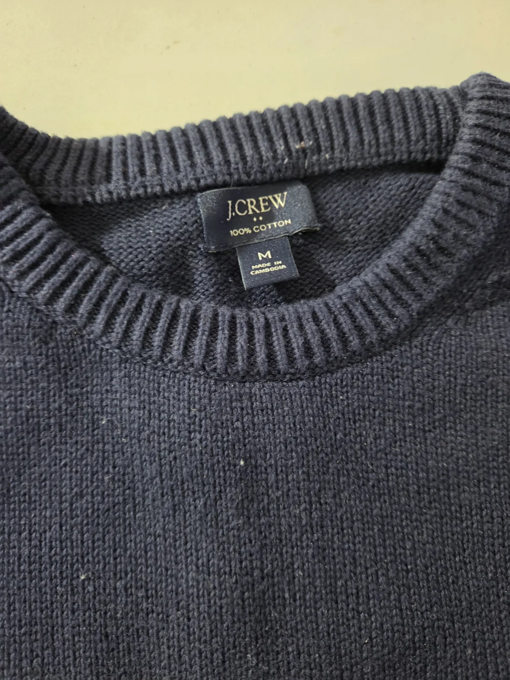 J. Crew Navy Crewneck Sweater with Cream Stripes and Red Accent